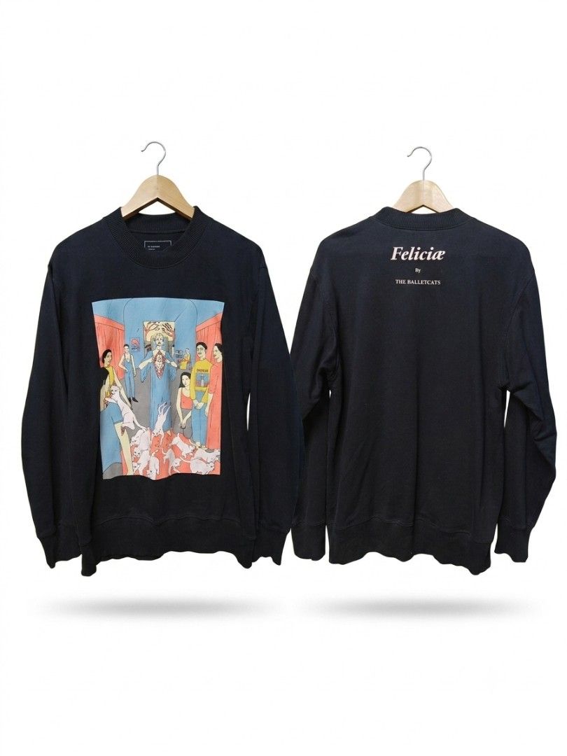 Felicia Black Graphic Print Sweatshirt (Category: Coats, Jackets and Outerwear) located in Manila. Submitted by meowbroke_24 (Listing ID 1444046402, Image 2). Description: - Black sweatshirt with a cool graphic print on the front. - Features 'Felicia' and text printed on the back. - Long sleeves and a classic crew neck design. - Perfect for everyday casual wear..
