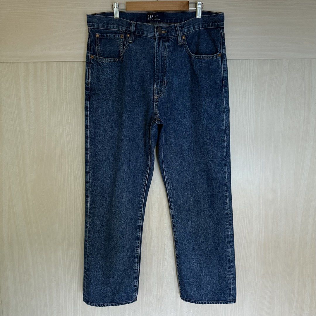 GAP Original Fit Jeans (Category: Jeans) located in Mandaluyong City. Submitted by babells (Listing ID 1443982713, Image 1). Description: Reason for selling: Decluttering Product details: Size - 32 inches on tag (Sizing is large, actual measurement is at 35 inches) Color - Faded Dark Indigo Fit - Original Fit (Relaxed Straight Fit) Relaxed through the hip and thigh; straight leg Button closure with zip fly Classic five-pocket styling Belt loops G