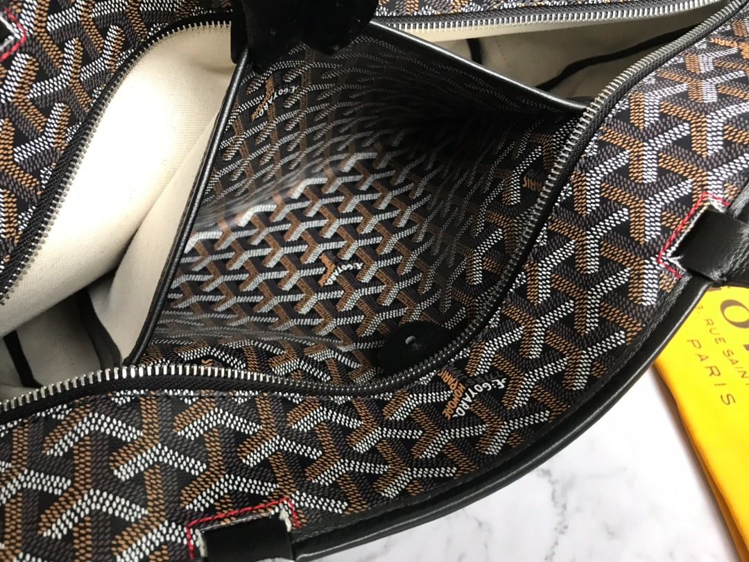 Goyard St. Louis Tote Bag (Category: Luxury Bags & Wallets) located in Quezon City. Submitted by berinavuth82129 (Listing ID 1443974196, Image 2). Description: - Authentic Goyard St. Louis Tote - Iconic all-over print - Black leather trim and handles - Includes dust bag and shopping bag - Spacious interior, ideal for everyday use or travel.