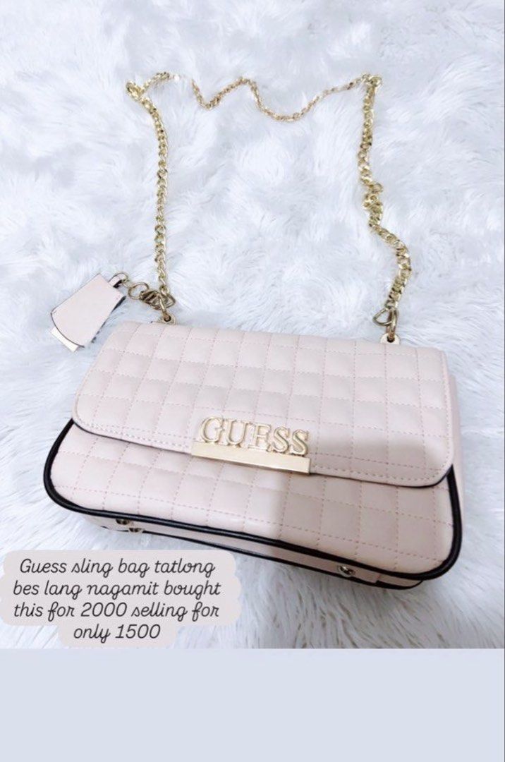 Guess Quilted Sling Bag (Category: Cross-body Bags) located in Cavite. Submitted by butfirstdecluttering (Listing ID 1444026432, Image 1). Description: - Guess sling bag - Original price: PHP 2000 - Selling price: PHP 1500 - Features a stylish gold chain strap - Elegant quilted design - Includes a small tag attached to the strap - Ideal for everyday wear Lalamove: gcash only payment first Jnt: depende sa location buyer ang mag book for pick up di
