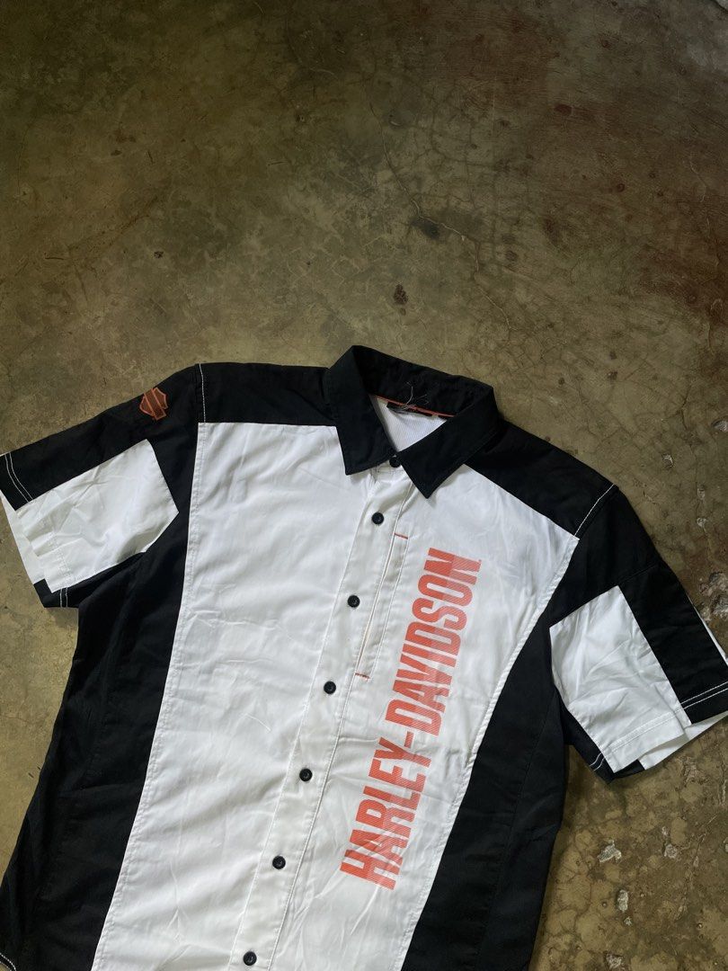 Harley-Davidson Short Sleeve Button Up Shirt (Category: Tshirts & Polo Shirts ) located in Cebu City. Submitted by warm.collegedropout (Listing ID 1444057018, Image 2). Description: -24 width -30 length - Cool Harley-Davidson short sleeve shirt - Classic logo on front, skull graphic on back - Black, white, and orange colorway - Button-up style - Perfect for casual wear and any fan.