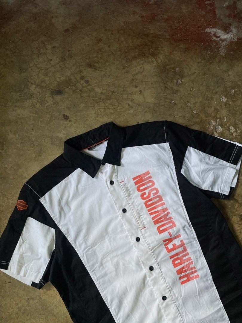Harley-Davidson Short Sleeve Button Up Shirt (Category: Tshirts & Polo Shirts ) located in Cebu City. Submitted by warm.collegedropout (Listing ID 1444057018, Image 3). Description: -24 width -30 length - Cool Harley-Davidson short sleeve shirt - Classic logo on front, skull graphic on back - Black, white, and orange colorway - Button-up style - Perfect for casual wear and any fan.