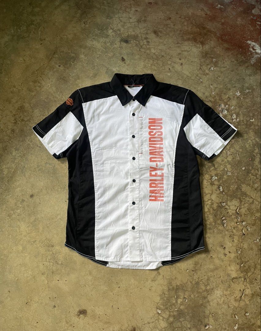 Harley-Davidson Short Sleeve Button Up Shirt (Category: Tshirts & Polo Shirts ) located in Cebu City. Submitted by warm.collegedropout (Listing ID 1444057018, Image 1). Description: -24 width -30 length - Cool Harley-Davidson short sleeve shirt - Classic logo on front, skull graphic on back - Black, white, and orange colorway - Button-up style - Perfect for casual wear and any fan.
