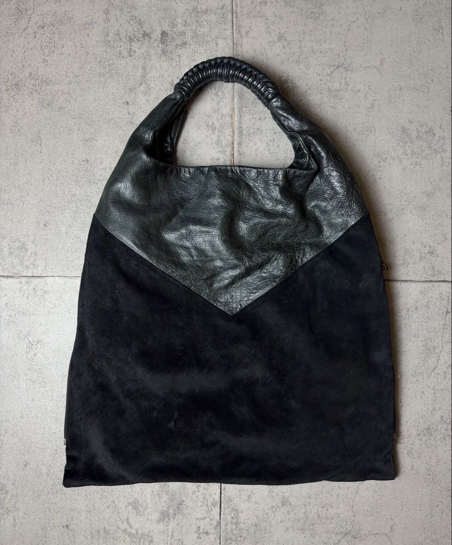 HELMUT LANG - LEATHER TRIMMED SUEDE HOBO BAG (Category: Shoulder Bags) located in Quezon City. Submitted by daboy_ (Listing ID 1444103808, Image 3). Description: Condition: 9/10 Material: Suede / Leather Made in: China Zipper: Ykk No inclusions Dimensions: W18” x H17” x Depth 5.5” x Strap Drop 7” .