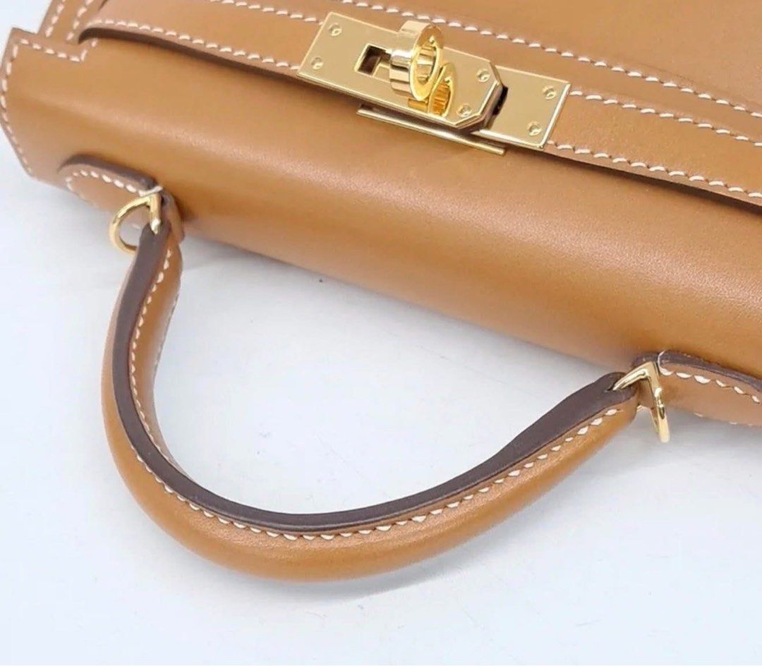 Hermes Mini Kelly (Category: Luxury Bags & Wallets) located in Manila. Submitted by jangmi93 (Listing ID 1444014432, Image 3). Description: Hermès Mini Lindy 20 Naturel Sable • Butler Leather • GHW Stamp Y | Full Set with original invoice Ultra-rare untreated heritage leather hard to find in the market. Serious buyers only. DM to inquire..