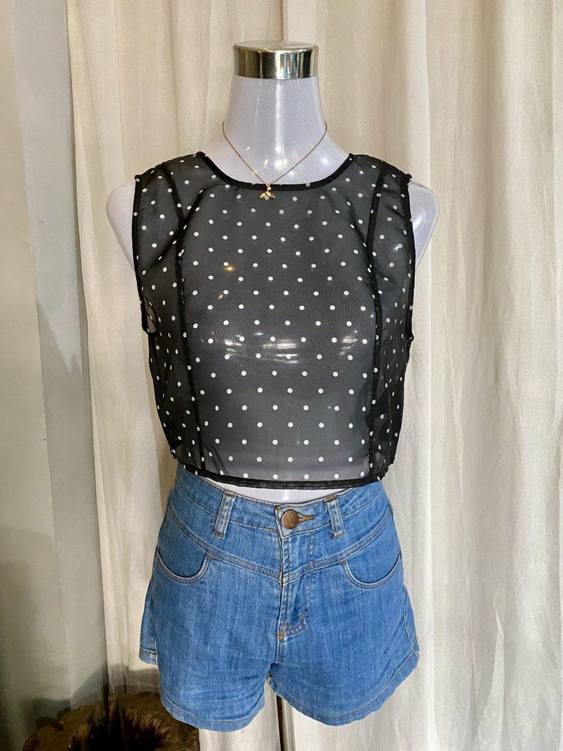 H&M Divided Black Polka Dot Sheer Mesh Crop Top (Category: Others Tops) located in Manila. Submitted by cami0110 (Listing ID 1444011637, Image 1). Description: - Black sheer mesh crop top - White polka dot pattern - Sleeveless design - Tie-back closure - Lightweight and airy - Brand: H&M Divided - Ideal for layering over bralettes or camisoles.