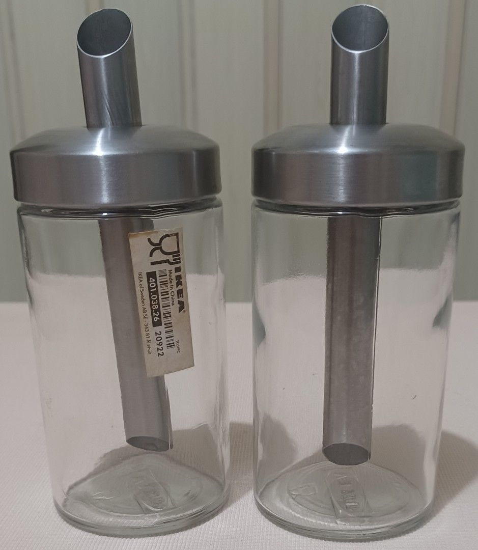 IKEA BLIKNING Sugar / Spice Pourer Set — 2pcs (Category: Food Organization & Storage) located in Quezon City. Submitted by wjmae (Listing ID 1444048599, Image 1). Description: ✅ Authentic IKEA glass + stainless steel set ✅ No‑mess spout design — great for sugar, salt, sprinkles ✅ Approx 6in tall — compact, easy to refill & clean ✅ No chips, cracks or stains — clean & ready to use ✅ Sleek minimalist style fits any kitchen.