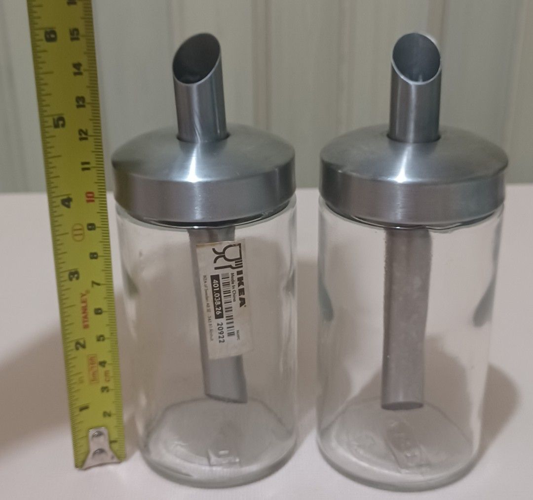 IKEA BLIKNING Sugar / Spice Pourer Set — 2pcs (Category: Food Organization & Storage) located in Quezon City. Submitted by wjmae (Listing ID 1444048599, Image 3). Description: ✅ Authentic IKEA glass + stainless steel set ✅ No‑mess spout design — great for sugar, salt, sprinkles ✅ Approx 6in tall — compact, easy to refill & clean ✅ No chips, cracks or stains — clean & ready to use ✅ Sleek minimalist style fits any kitchen.