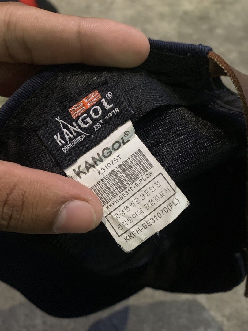 Kangol Navy Blue Baseball Cap with Leather Strap (Category: Caps & Hats) located in Manila. Submitted by loyspalencia (Listing ID 1444037014, Image 3). Description: - Navy blue Kangol baseball cap - Features classic yellow embroidered kangaroo logo on the front - Adjustable leather strap at the back for a custom fit - Ideal for everyday casual wear.