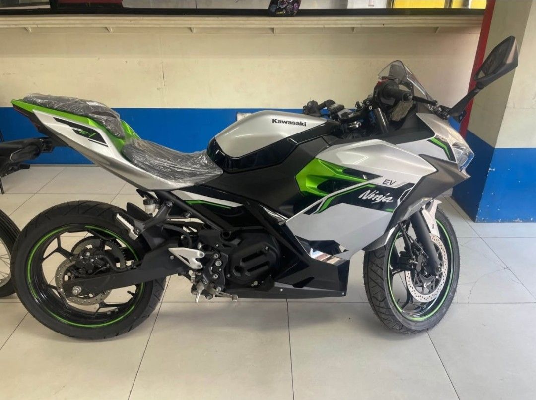 Kawasaki Ninja EV Electric Motorcycle (Category: Motorbikes for Sale) located in Davao. Submitted by dareyl_121422 (Listing ID 1443955640, Image 1). Description: Silver and green electric Ninja motorcycle. Looks sharp and sporty. Ready for a new rider. Great for city commuting or weekend rides. Low maintenance electric power. Get around town in style. Message for details..