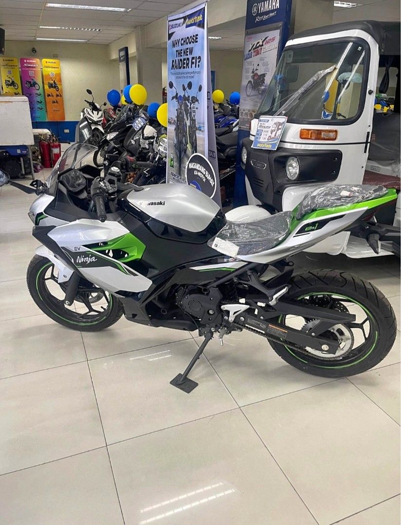 Kawasaki Ninja EV Electric Motorcycle (Category: Motorbikes for Sale) located in Davao. Submitted by dareyl_121422 (Listing ID 1443955640, Image 2). Description: Silver and green electric Ninja motorcycle. Looks sharp and sporty. Ready for a new rider. Great for city commuting or weekend rides. Low maintenance electric power. Get around town in style. Message for details..