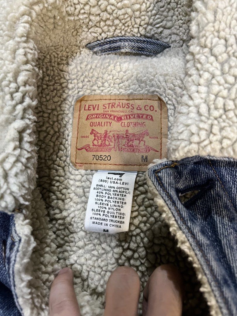 Levi's Original Riveted Denim Sherpa Trucker Jacket (Category: Coats, Jackets and Outerwear) located in Caloocan City. Submitted by leo.noelalonzo (Listing ID 1444079206, Image 2). Description: - Classic Levi's denim jacket - Sherpa lined for extra warmth - Original riveted quality construction - Standard trucker style - Size: Medium (M) - Ideal for cooler weather - Durable denim build.