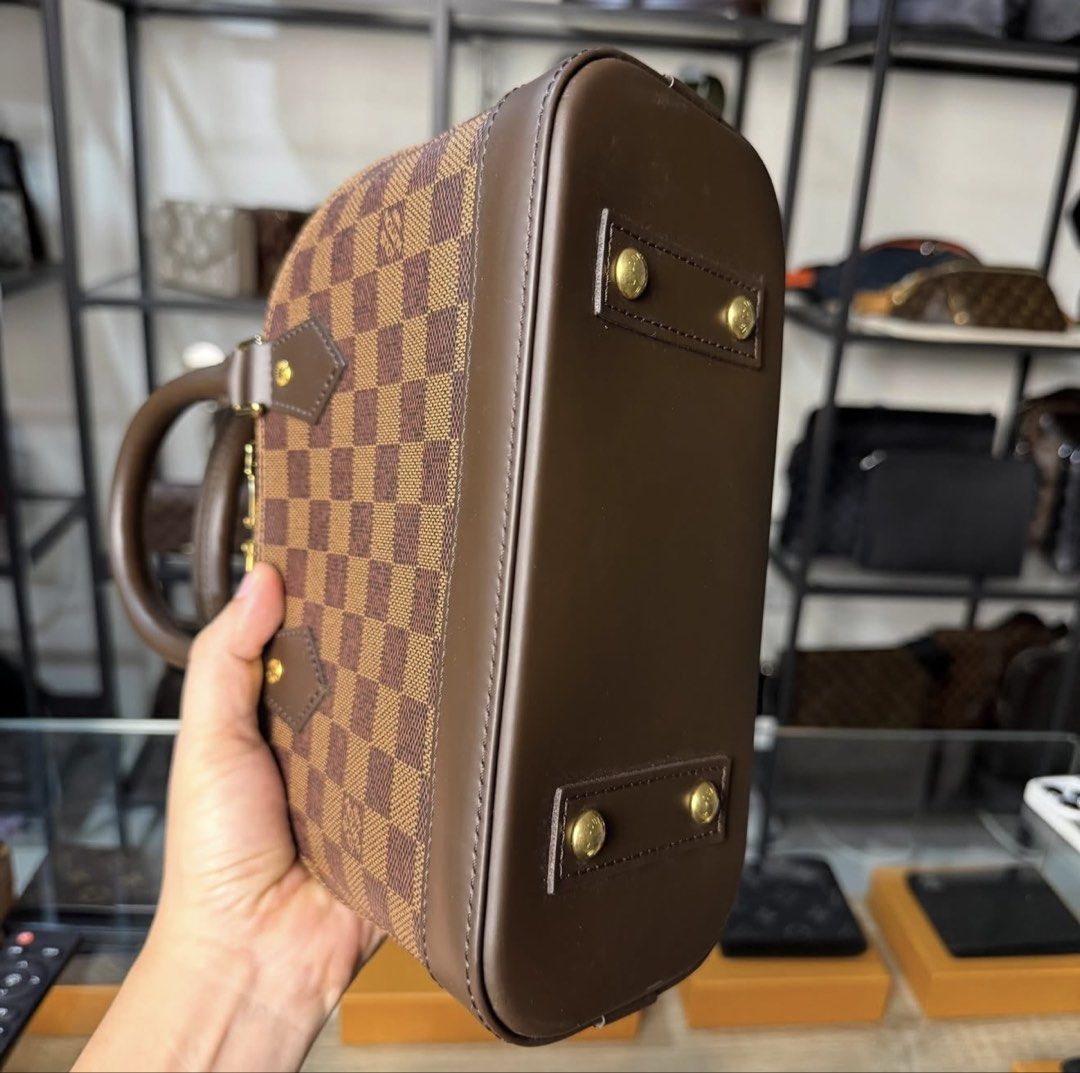 Louis Vuitton Damier Ebene Alma BB (Category: Luxury Bags & Wallets) located in Manila. Submitted by jangmi93 (Listing ID 1444095073, Image 3). Description: Louis Vuitton Alma BB Damier Ebene Gold Hardware Mint Condition With Microchip Classic LV piece that never goes out of style. Price: ₱110,000 (Still Nego) Serious buyers only. DM to inquire..