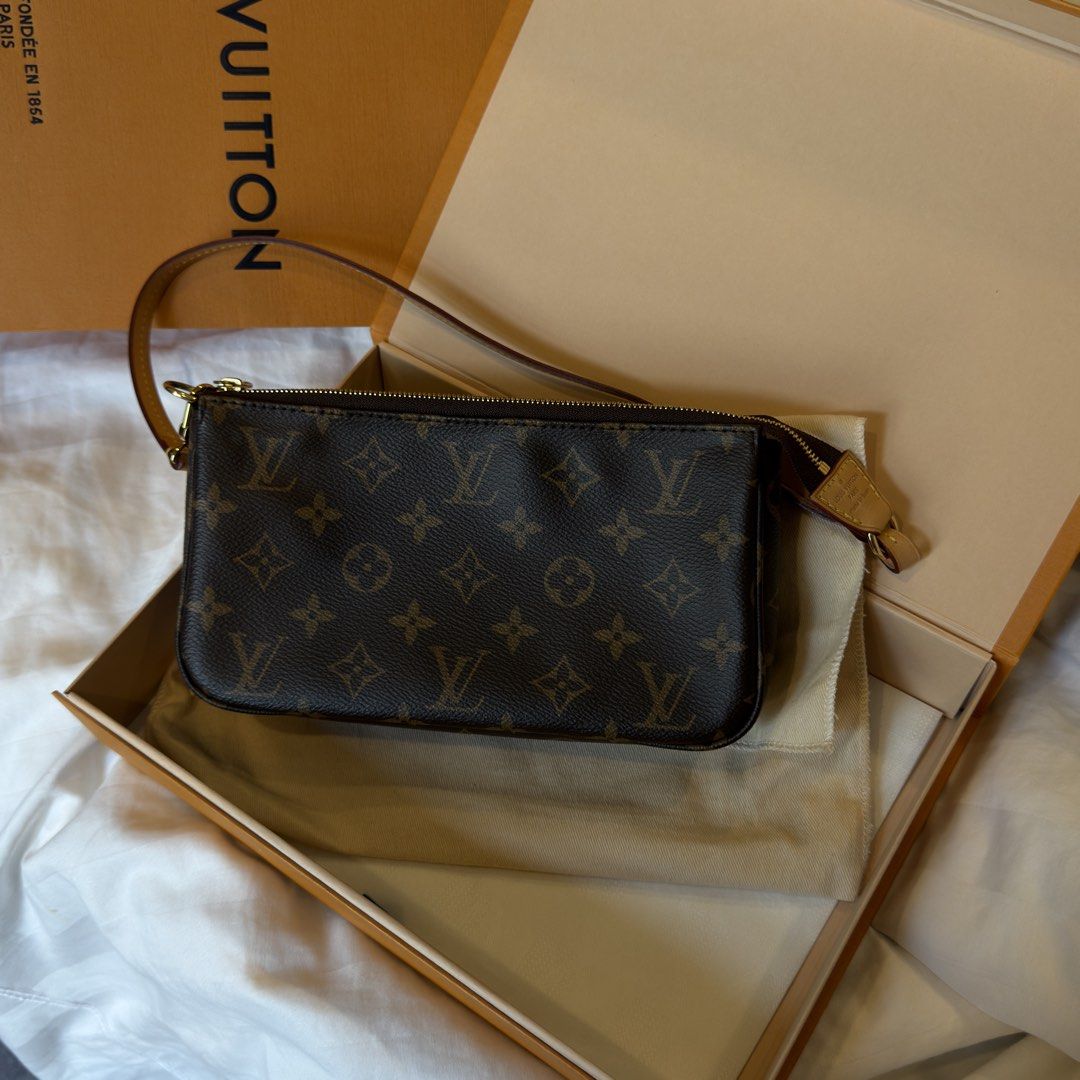 Louis Vuitton Monogram Pochette Accessories (Category: Luxury Bags & Wallets) located in Taguig. Submitted by mainsourceph (Listing ID 1443485949, Image 1). Description: Louis Vuitton Monogram Pochette Accessories Microchipped Kept and unused condition Box, Dust bag, Paper bag.