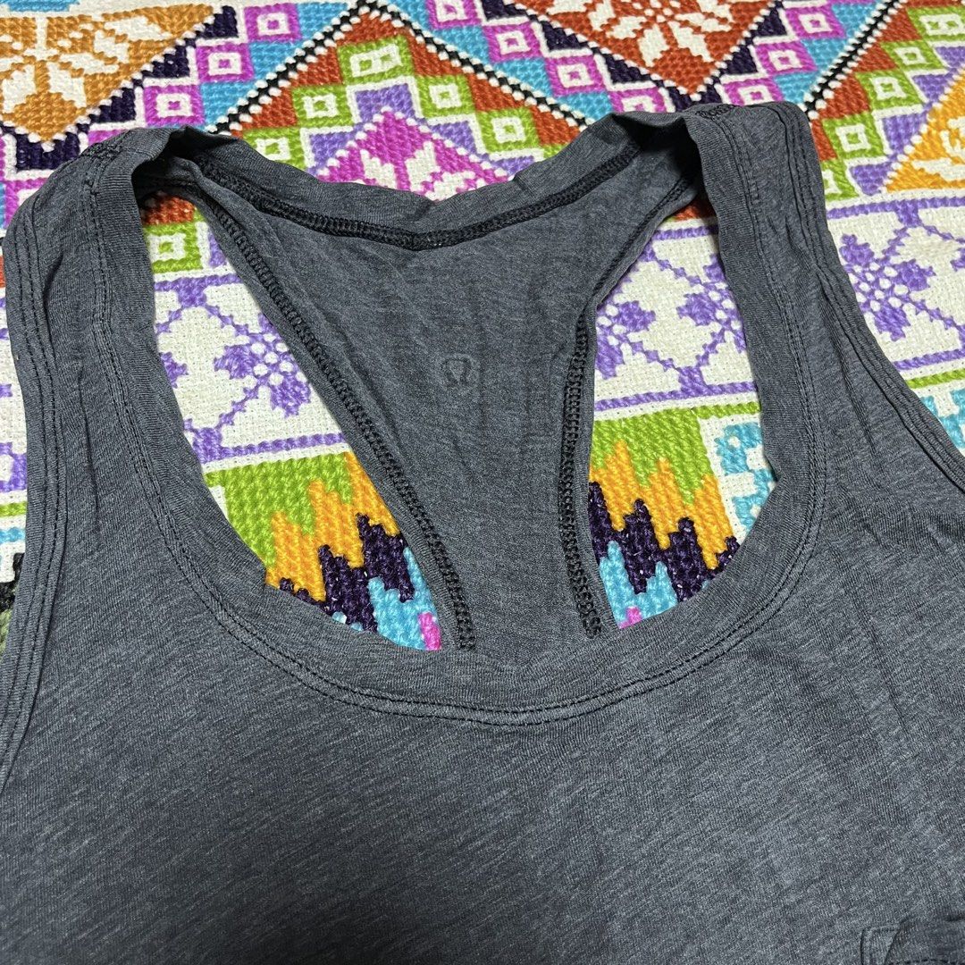Lululemon Grey Racerback Tank Top with Pocket (Category: Activewear) located in Dagupan City. Submitted by vernzkee (Listing ID 1443969768, Image 3). Description: Size 4 - Grey Lululemon tank top - Racerback style - Small pocket on left chest - Soft, breathable fabric - Ideal for workouts or casual wear - Curved hemline Location: Dagupan City, Pangasinan MOP: Gcash, Maya, BPI, BDO or Gotyme Shipping via JnT.