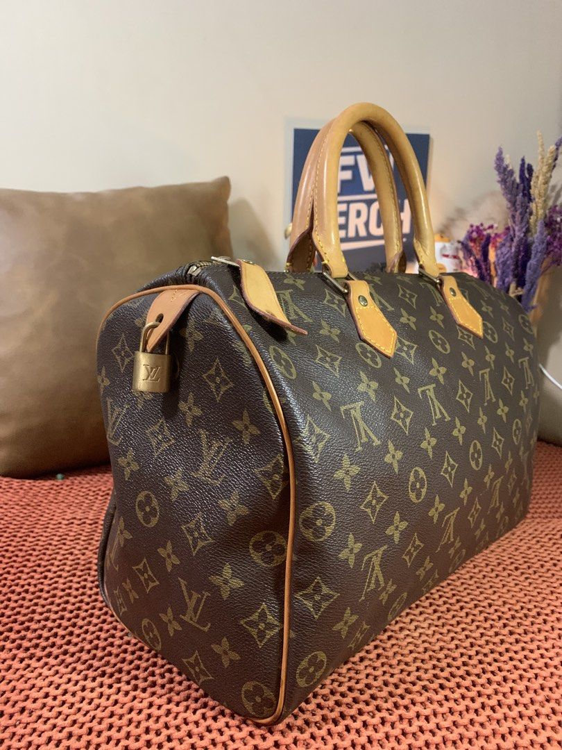 LV Speedy Size 35 Coded with Lock (no key) (Category: Luxury Bags & Wallets) located in Mandaluyong City. Submitted by fv_merch (Listing ID 1395895897, Image 3). Description: Super nice leather; #speedy35 Coded with lock (no key). No major flaws Size 35 ⚠️ Logo and trademarks are the property of their respective owners. We are not affiliated with, endorsed by, or associated with the brand. All items are legally acquired preloved goods..