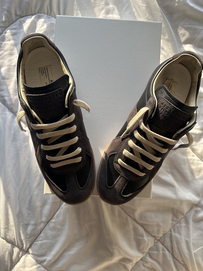 Maison Margiela Black & Brown Gats (Category: Sneakers & Footwear) located in Quezon City. Submitted by jamessfoundwhatt (Listing ID 1444019777, Image 1). Description: • Used 4 times • High Quality UA • 10/10 Condition • No issues •EUR 42/US 9-9.5 • Rfs: Not quite my preferred color-way • Negotiable Price for sure buyers • Buyer’s Shoulder SF via lalamove/J&T.