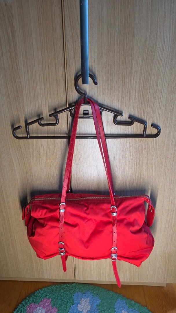 Marge Sherwood Overpacker Bag Red (Category: Shoulder Bags) located in Makati City. Submitted by vida888 (Listing ID 1443937675, Image 2). Description: - Marge Sherwood Overpacker Bag Red (https://global.margesherwood.com/collections/overpacker/products/overpacker-red) - Adjustable leather straps - Bought on sale last year for 7.8k. Current retail price is now at 17.8k - Barely used, I think less than 3x. Has just been stored in dust bag. Hardwar