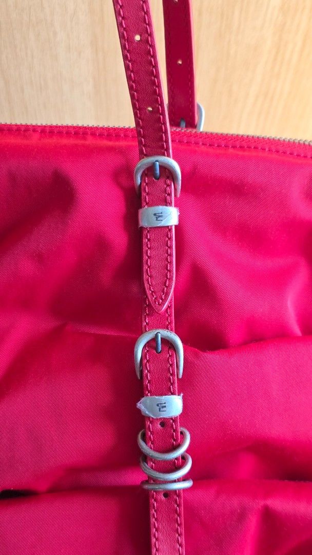 Marge Sherwood Overpacker Bag Red (Category: Shoulder Bags) located in Makati City. Submitted by vida888 (Listing ID 1443937675, Image 3). Description: - Marge Sherwood Overpacker Bag Red (https://global.margesherwood.com/collections/overpacker/products/overpacker-red) - Adjustable leather straps - Bought on sale last year for 7.8k. Current retail price is now at 17.8k - Barely used, I think less than 3x. Has just been stored in dust bag. Hardwar