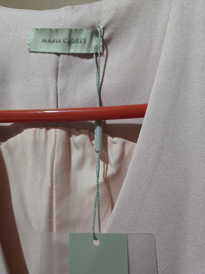 Maria Closet Pink Sleeveless Vest with Buttons (Category: Sleeveless) located in Las Pinas. Submitted by luxeprelovedstuff (Listing ID 1444046829, Image 3). Description: - Brand: Maria Closet - Color: Pink - Style: Sleeveless vest - Features: Two button details on the front - Condition: Brand new with tags attached - Styling: Ideal for layering and adding a pop of color to any outfit.