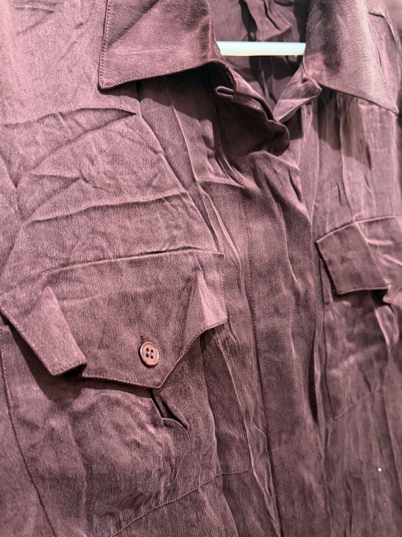 Maroon Long Sleeve Button Up Shirt with Pockets (Category: Tshirts & Polo Shirts ) located in Pasay City. Submitted by petiteprelovecloset (Listing ID 1444082858, Image 2). Description: - Maroon long sleeve shirt - Two chest pockets with button closures - Button cuffs on sleeves - Subtle textured fabric pattern - Relaxed fit - Ideal for casual wear or layering or cover up -Oversize Polo -Office Top -Silk Maroon blouse -Office Polo -Button down To