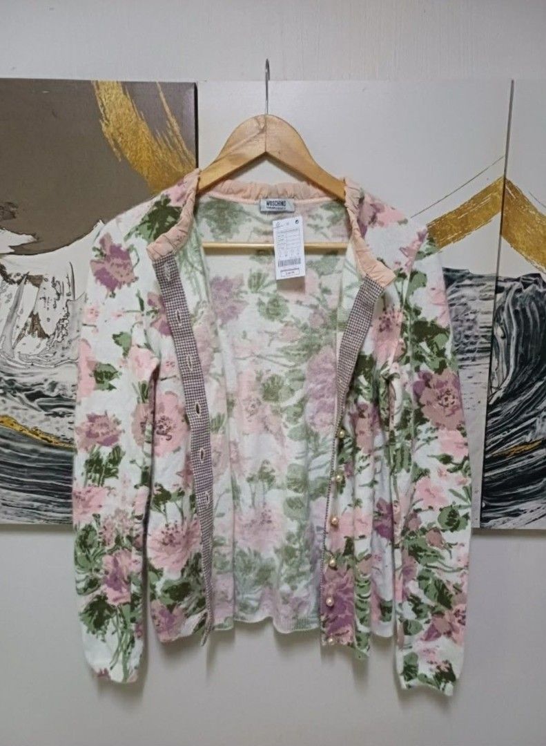 Moschino Floral Button-Up Cardigan (Category: Luxury Apparel) located in Manila. Submitted by tokyo.americana (Listing ID 1444047064, Image 2). Description: Super stretchable fabric Actual size using inches Armpit to Armpit/18.5 Lenght/24 fittings is Medium Excellent Condition, Issue:0 Message if you have any other question about sizing. We do shipping nation wide I'm also open for video call so that you can see the item you 're interested to buy