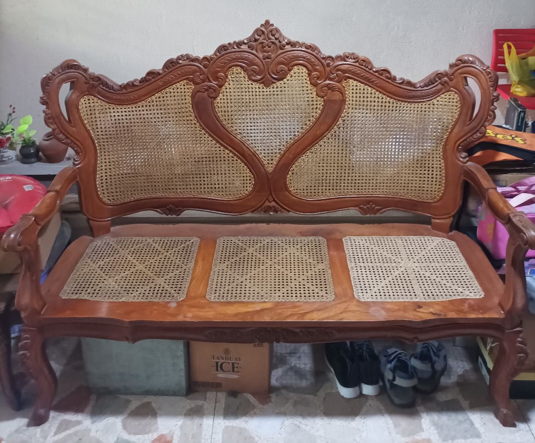 Narra Sala Set with woven cane (Category: Sofas) located in Pasig City. Submitted by hamilz (Listing ID 1444004438, Image 1). Description: - Include 2 Vintage wooden tables - Include 3 Vintage wooden sofa - Features intricate carved wood details - Warm, rich wood tone - Tables are perfect for lamps, books, or decorative items - Adds a classic, elegant touch to any living room - Price lowered from 32,000 to 28,000 - For pickup only, slightly negot