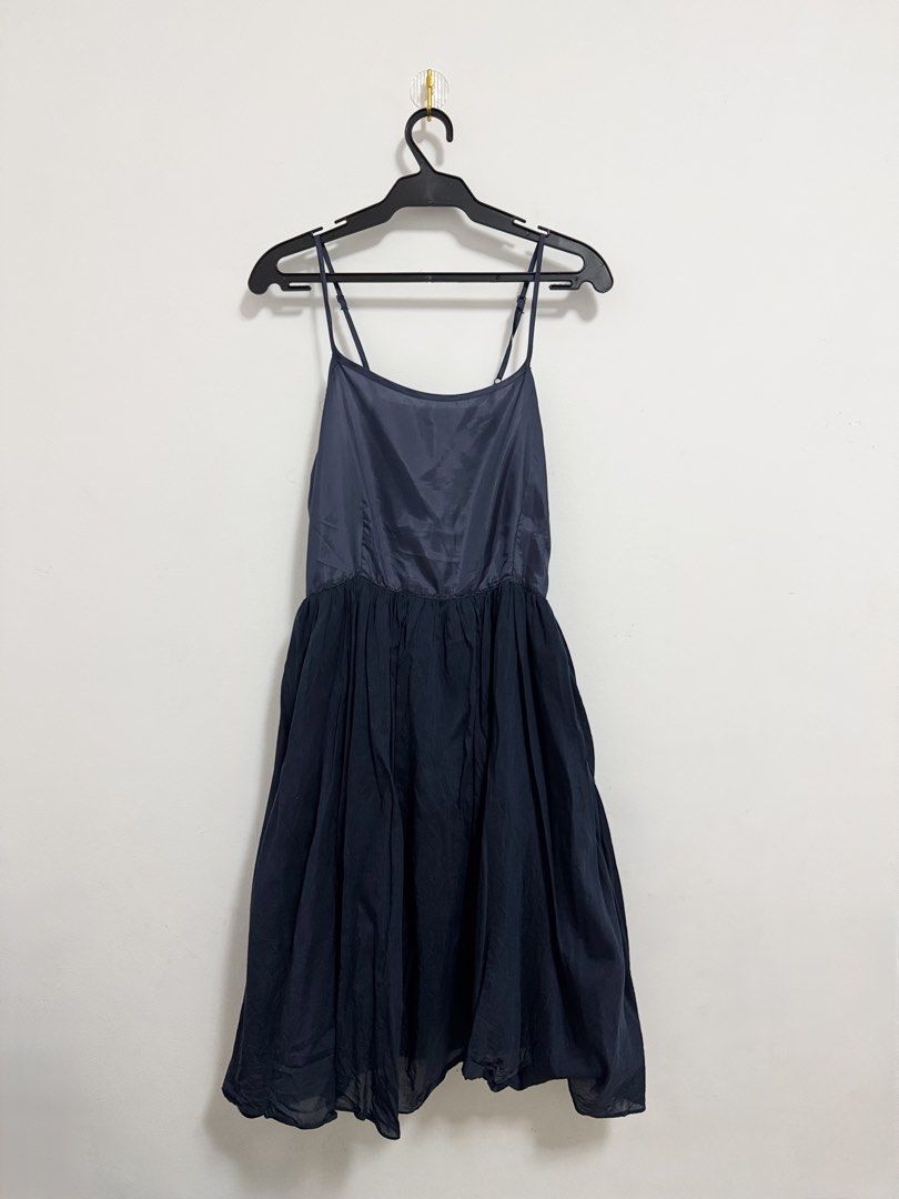 Navy Blue Slip Dress with Adjustable Straps (Category: Dresses) located in Makati City. Submitted by norisubi (Listing ID 1444073667, Image 1). Description: - Elegant navy blue slip dress - Satin-like material on the bodice with flowy - Adjustable spaghetti straps for a perfect fit - Minor issues with strap and fabric (see images for closer look) MOP: Gcash/Maribank/Bank Transfer (BDO) MOD: SDD via Lalamove/Grab/Angkas or J&T (sf shouldered by bu