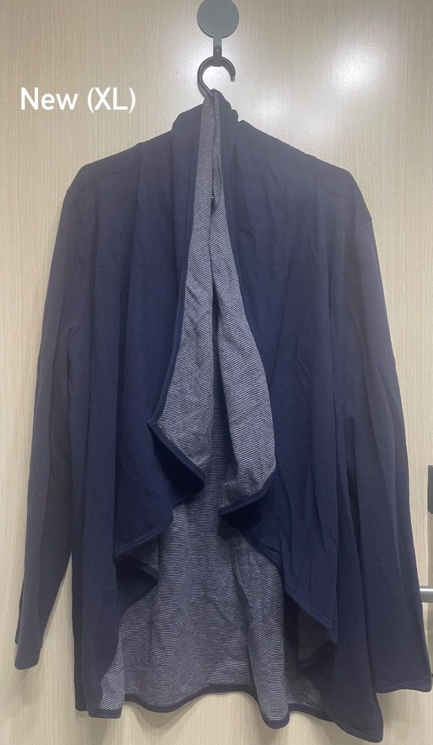 New Navy Blue Cardigan XL (Category: Coats, Jackets and Outerwear) located in Pasig City. Submitted by mishmash2026.83 (Listing ID 1443972485, Image 1). Description: Navy blue cardigan with a striped lining. Waterfall front. Size XL. Never worn..