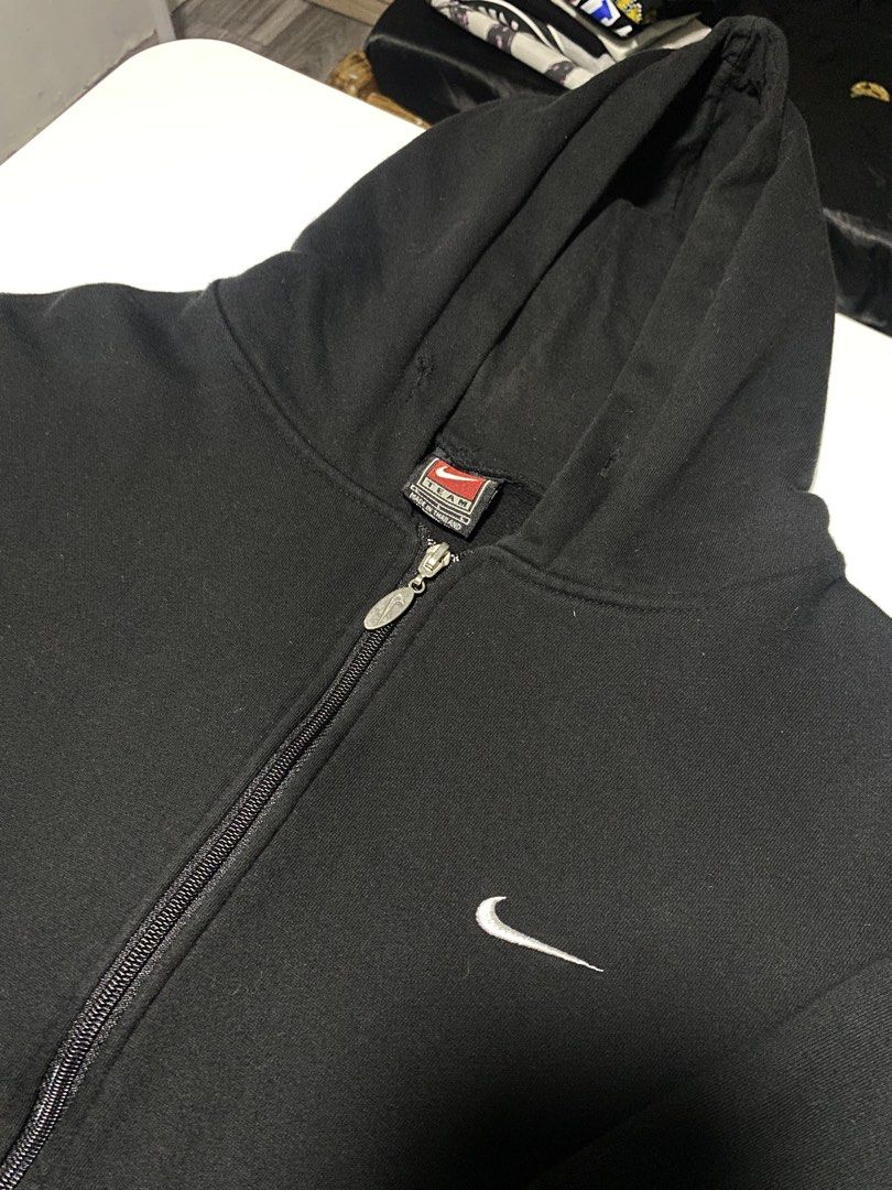 Nike Black Zip-Up Hoodie (Category: Coats, Jackets and Outerwear) located in Manila. Submitted by pm302957949932 (Listing ID 1443957384, Image 3). Description: Nike Vintage Sideswoosh Hoodie 21 x 25 Needwash 9.5/10 color rate.