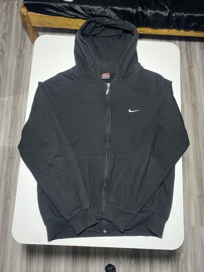 Nike Black Zip-Up Hoodie (Category: Coats, Jackets and Outerwear) located in Manila. Submitted by pm302957949932 (Listing ID 1443957384, Image 2). Description: Nike Vintage Sideswoosh Hoodie 21 x 25 Needwash 9.5/10 color rate.