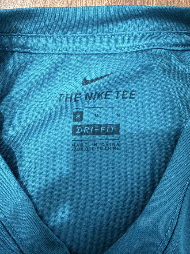 Nike Dri-Fit T-Shirt Men's Medium (Category: Tshirts & Polo Shirts ) located in Manila. Submitted by ckftz (Listing ID 1443998568, Image 3). Description: Used once only. Authentic bought in Nike official store. Fits small-medium. Dri-fit. Medium on tag. .