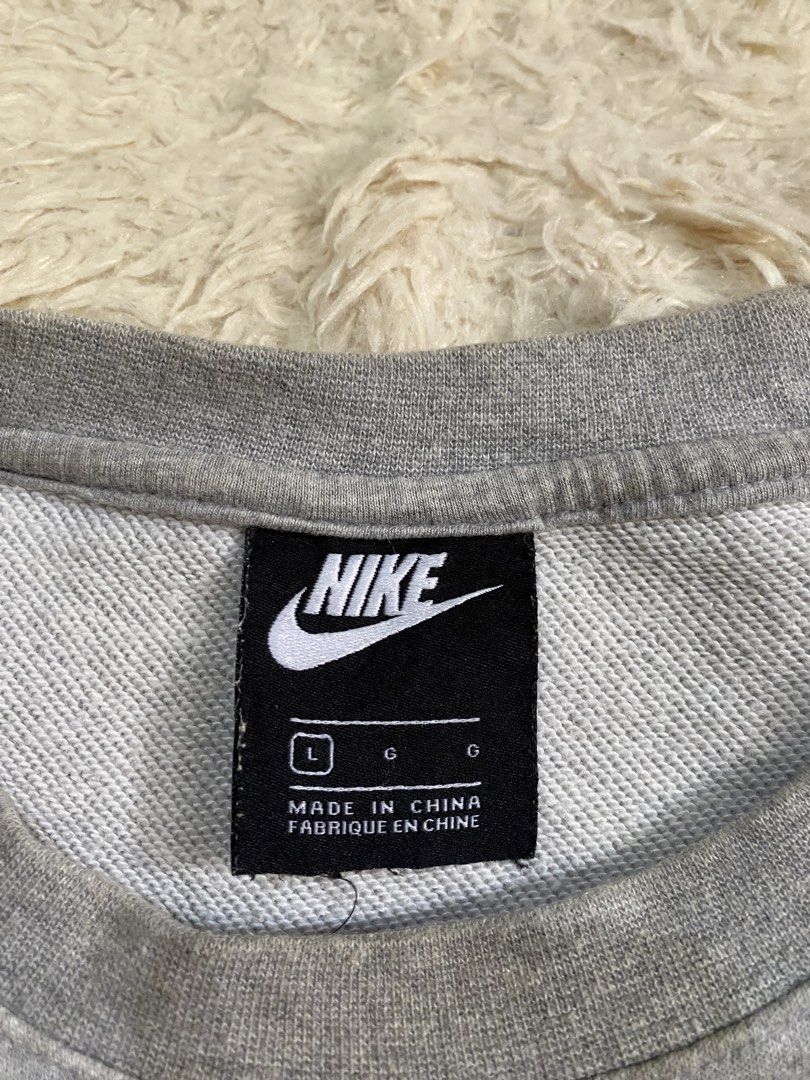 Nike Grey Crewneck Sweatshirt (Category: Coats, Jackets and Outerwear) located in Cebu City. Submitted by stevenkylegil (Listing ID 1443961088, Image 3). Description: Nike Clubfleece Sweatshirt Dimension W25 L28.5 Verygood Condition Color rate 9.5/10 No issue Dm to purchase.