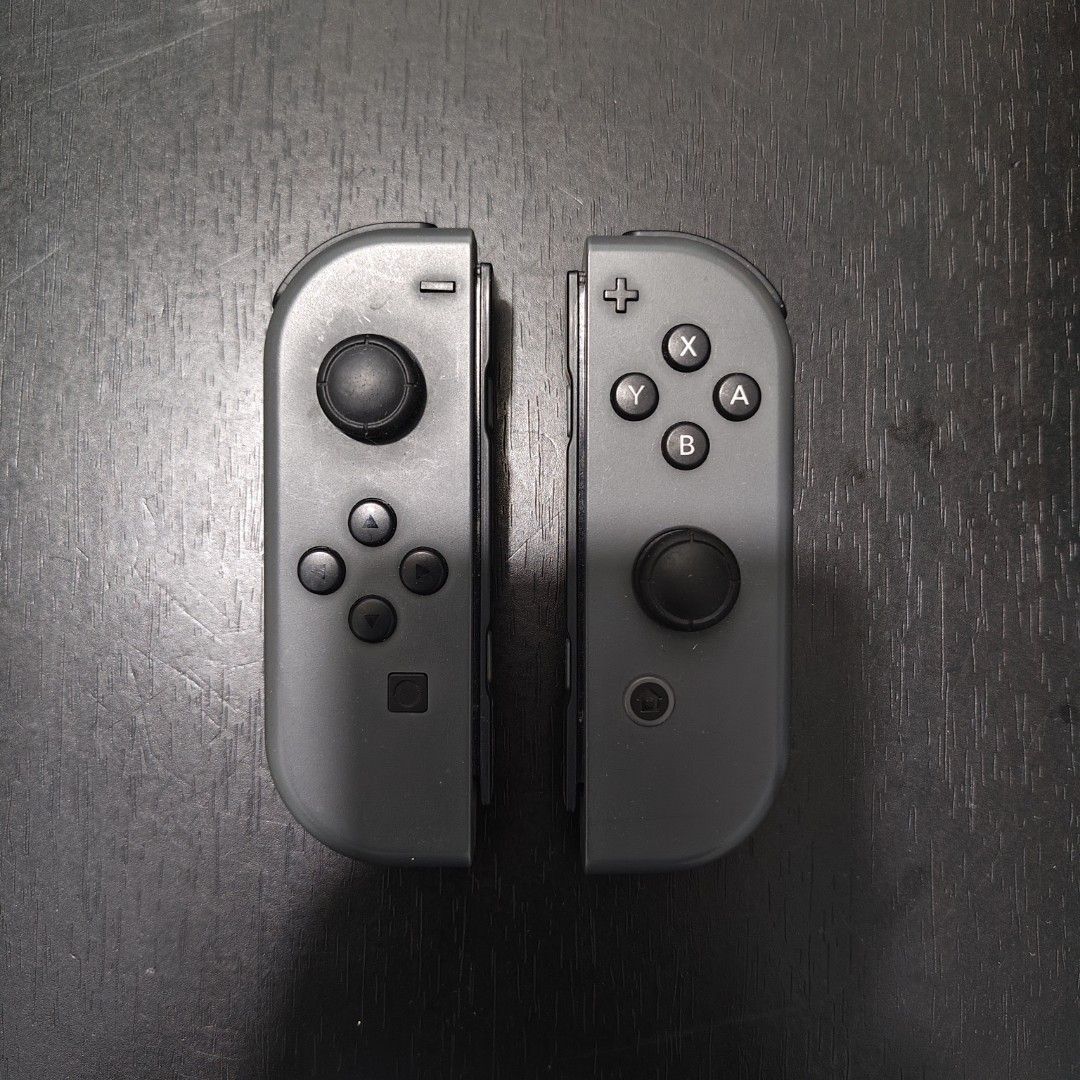 Nintendo Switch 2017 Version (Category: Nintendo) located in Pasig City. Submitted by Strenuous467812 (Listing ID 1444109730, Image 2). Description: Items Included: 1 Screen with Screen Protector Applied 4 Joycons 1 Dock 1 Charger 1 Controller Grip 4 Joycon Straps 1 Joycon Leg Strap 1 MicroSD Card 256G Size Included Formatted 1 Stand 1 Third Party Dock (Brand GuliKit) 1 Joycon Grip with Screen Attachment 2 Cases (Big & Small Sizes) Note: The hand