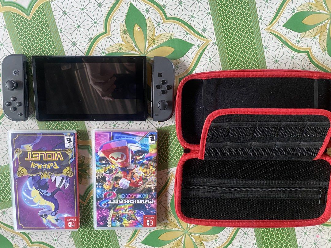 Nintendo Switch V2 non oled (Category: Other Mobile & Gadget Accessories) located in Manila. Submitted by franznoelg04319 (Listing ID 1443913026, Image 3). Description: Fs: Nintendo Switch v2 non oled Slightly used With case No stickdrift Includes: Pokémon Violet Mario Kart 8.