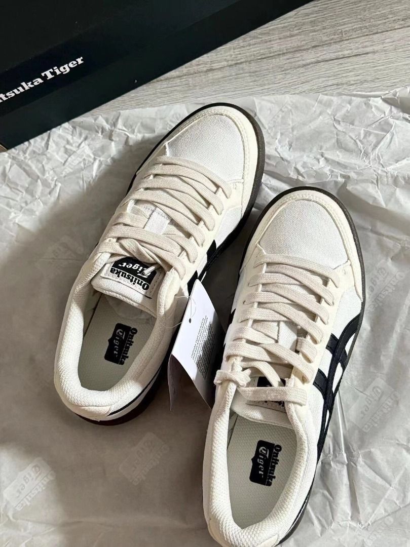 Onitsuka Tiger ADVANTI sneakers in classic off-white and black color scheme, retro and casual. (Category: Sneakers) located in Singapore. Submitted by asingaporecity (Listing ID 1444056009, Image 3). Description: .
