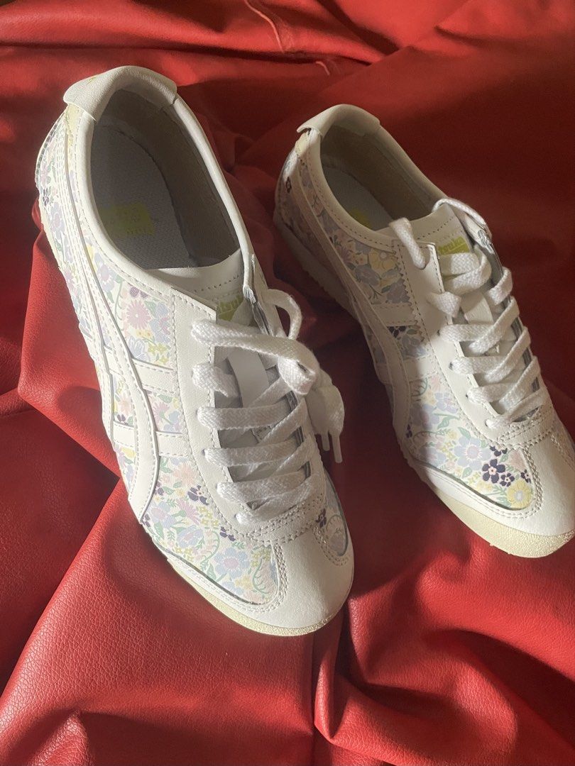 Onitsuka Tiger Mexico 66 Floral Print Sneakers (Category: Sneakers) located in Singapore. Submitted by 2nd_xaround (Listing ID 1443947484, Image 1). Description: - Cute Onitsuka Tiger sneakers - White base with pastel floral print - Classic and comfortable for everyday wear - White laces - Light cream soles - Adds a pop of color to any outfit.