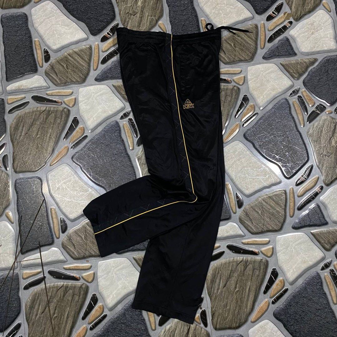 Peak Trackpants Side tape design (Category: Joggers) located in Sorsogon. Submitted by jerome_ignacio (Listing ID 1444095256, Image 2). Description: Peak Track-pants Sidetape design! Good as new condition no any flaw 28 to 32 waistline 39 length - Actual photo posted. Not affiliated with or promoting any brands. All trademarks belong to rightful owner..