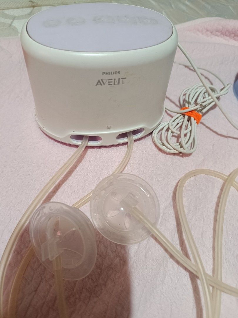 Philips Avent Electric Breast Pump with Storage Cups (Category: Breastfeeding & Bottle Feeding) located in Las Pinas. Submitted by anneguevarra0905 (Listing ID 1443932971, Image 1). Description: - Philips Avent electric breast pump set - Includes pump unit, power adapter, tubing, and breast shields - Comes with Avent milk storage cups - Everything you need to start pumping - Ideal for breastfeeding mothers - Sold as a complete set.
