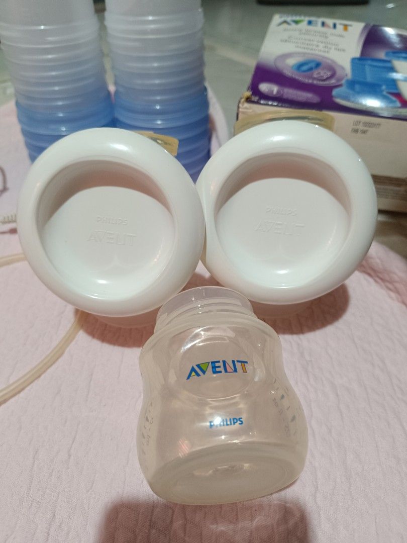 Philips Avent Electric Breast Pump with Storage Cups (Category: Breastfeeding & Bottle Feeding) located in Las Pinas. Submitted by anneguevarra0905 (Listing ID 1443932971, Image 2). Description: - Philips Avent electric breast pump set - Includes pump unit, power adapter, tubing, and breast shields - Comes with Avent milk storage cups - Everything you need to start pumping - Ideal for breastfeeding mothers - Sold as a complete set.