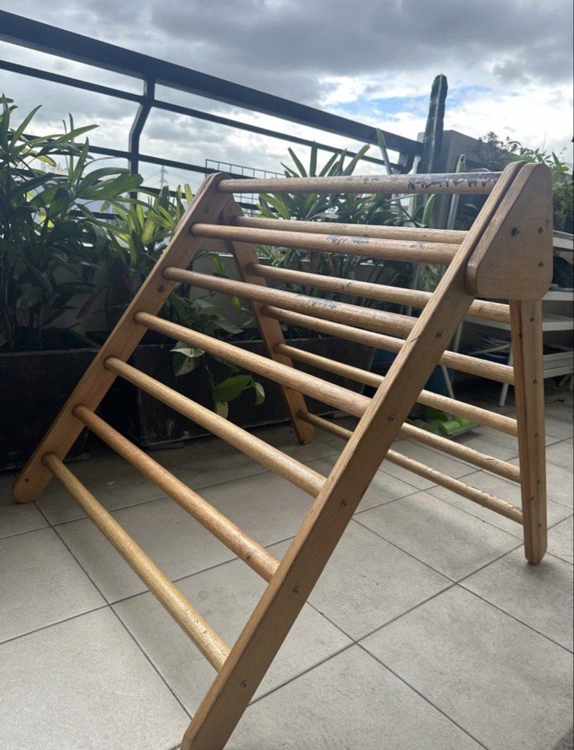 Pickler triangle with slide (Category: Infant Playtime) located in Quezon City. Submitted by __lilyandpoppy (Listing ID 1443921319, Image 1). Description: Pickler triangle with slide for your child’s motor skills, notable flaws as seen are pen markers but do not affect the toy quality.