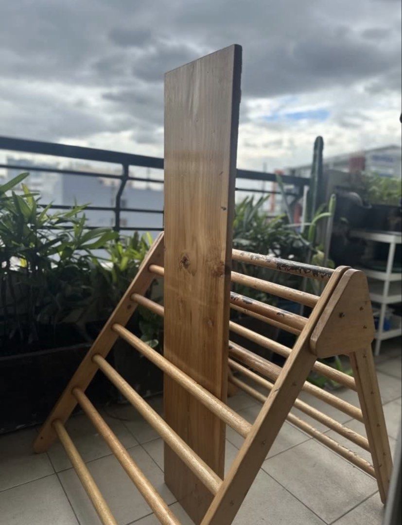 Pickler triangle with slide (Category: Infant Playtime) located in Quezon City. Submitted by __lilyandpoppy (Listing ID 1443921319, Image 2). Description: Pickler triangle with slide for your child’s motor skills, notable flaws as seen are pen markers but do not affect the toy quality.