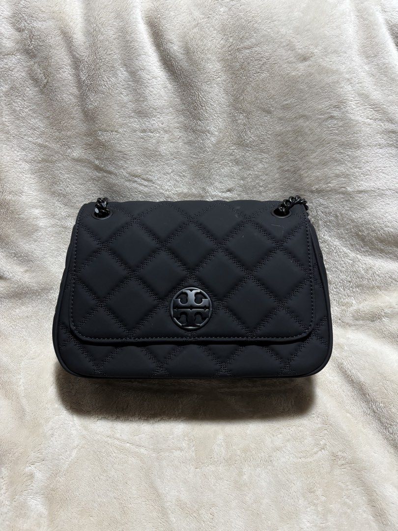(Preloved) Tory Burch Willa Matte Convertible Shoulder Bag (Category: Luxury Bags & Wallets) located in Quezon City. Submitted by _aritan (Listing ID 1443986061, Image 1). Description: Authentic Tory Burch Willa Matte Shoulder Convertible Bag (with dustbag) - 7”h x 9.8”L x 2.7”w - used 2-3x only - black matte double chain with handle - double up strap drop - magnetic snap closure With small flaws - small unnoticeable oil smidge - small paint chaf