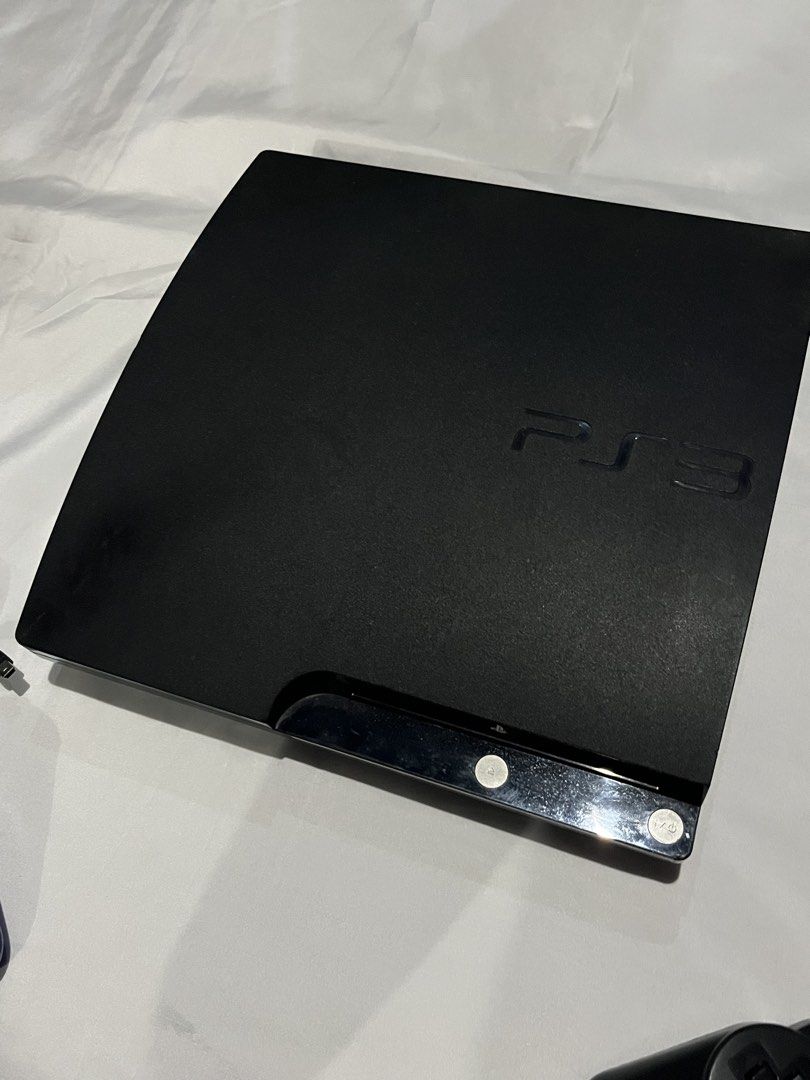 PS3 Slim 256 GB Jailbreak (Category: PlayStation) located in Adams. Submitted by princess.maggie (Listing ID 1444032590, Image 3). Description: PS3 Slim Jailbreak 256GB - in excellent condition - complete inclusions (cords) - no overheat - with 4 controllers - installed na ng games - games included: - Call of Duty: MW3 - Dragon Ball Z - God Of War - GTA V - Hitman: Absolution - Red Dead Redemption - Resident Evil 6 - Sonic Racing - Spider-Man - T