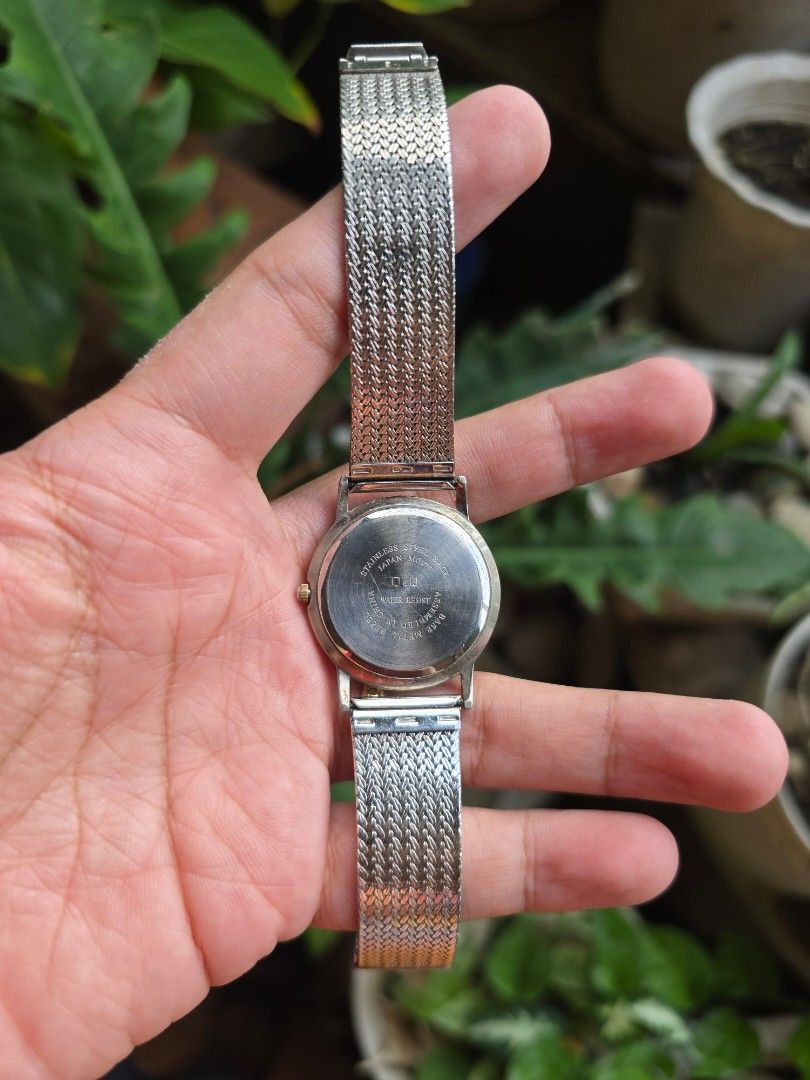 Q&Q Water Resist Analog Watch (Category: Women's Watches) located in Manila. Submitted by timearcph (Listing ID 1443974306, Image 2). Description: This is a Citizen Q&Q Crater quartz watch featuring a gold-tone dial bezel, a white face with gem-style markers, and a silver-tone metal strap.Brand: Q&Q, a subsidiary brand of Citizen.Model Line: Crater series.Features: Water-resistant design, quartz movement, and stainless steel case back..