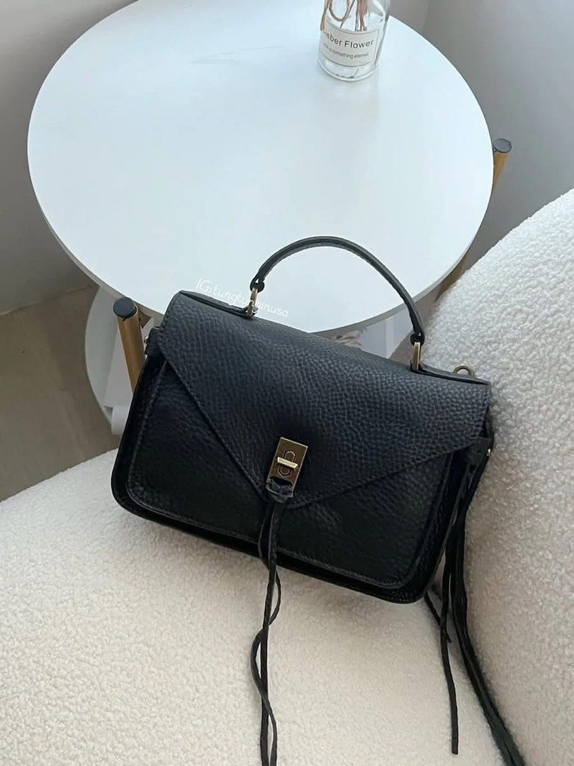 Rebecca Minkoff Darren Black pebbled leather shoulder bag with gold toned hardware on the strap Signature turn-lock closure (Category: Shoulder Bags) located in Davao. Submitted by arthury421 (Listing ID 1444105683, Image 2). Description: Rebecca Minkoff Darren Black pebbled leather shoulder bag with gold toned hardware on the strap Signature turn-lock closure Sa mga nakaka alam kay Rebecca Minkoff! Alam na niya yan 🙂 Size on tape: L 12 inch - W