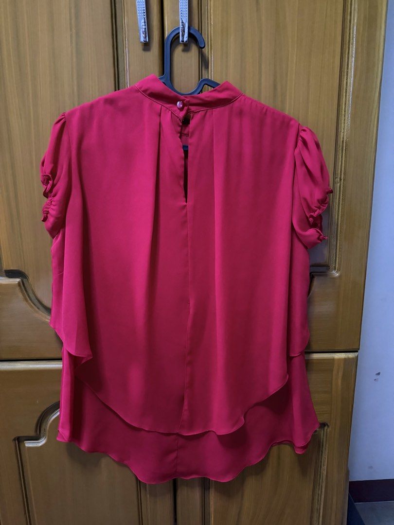 Red Short Sleeve Blouse with High Neck and Layered Hem (Category: Blouses) located in Rizal. Submitted by shop.preloved.ph (Listing ID 1444011792, Image 3). Description: RFS: decluttering Size: Shoulder: 15” Length: 27”.