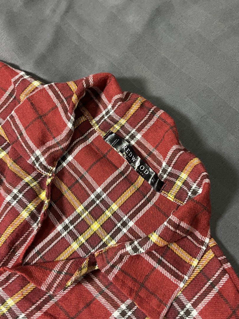 Redwood Plaid Short Sleeve Button Up Shirt (Category: Tshirts & Polo Shirts ) located in Pasay City. Submitted by 777angelbaby (Listing ID 1444029921, Image 2). Description: - Brand: Redwood - Style: Short-sleeve button-up shirt - Pattern: Classic red, yellow, and white plaid - Occasion: Perfect for casual wear.