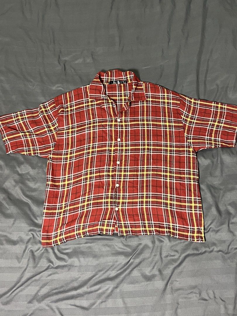Redwood Plaid Short Sleeve Button Up Shirt (Category: Tshirts & Polo Shirts ) located in Pasay City. Submitted by 777angelbaby (Listing ID 1444029921, Image 1). Description: - Brand: Redwood - Style: Short-sleeve button-up shirt - Pattern: Classic red, yellow, and white plaid - Occasion: Perfect for casual wear.