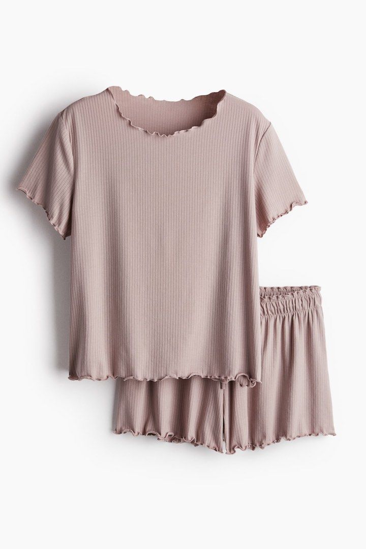 Ribbed Lettuce Trim Pajama Set - Pink (Category: Undergarments & Loungewear) located in Manila. Submitted by paperthread (Listing ID 1444076123, Image 1). Description: Actual color is dusty pink 2nd photo is when worn. - Cute ribbed pajama set - Lettuce trim on neckline and hem - Elastic waistband shorts for comfort - Soft and breathable fabric - Perfect for lounging at home - Lovely pink shade.